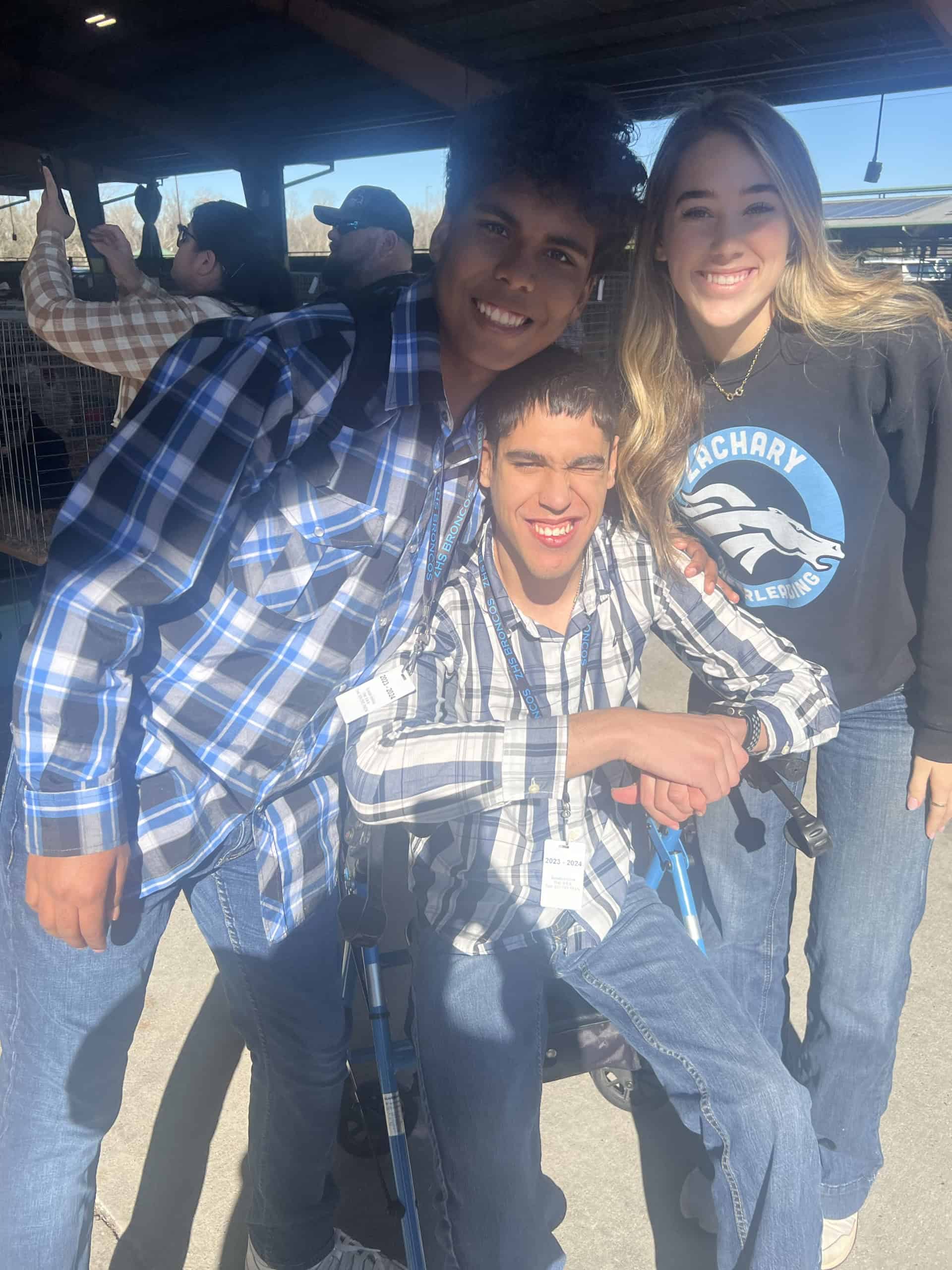 Charles Martin (left), Addison Brian (right) and Caudab Wiltz (center) developed a close relationship through participating in the AG Buddy program.