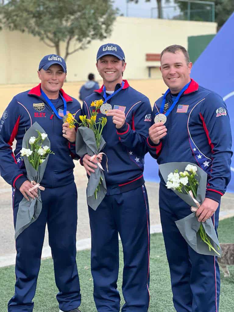 Phillip Jungman (right) celebrates with his USA Shooting teammates.