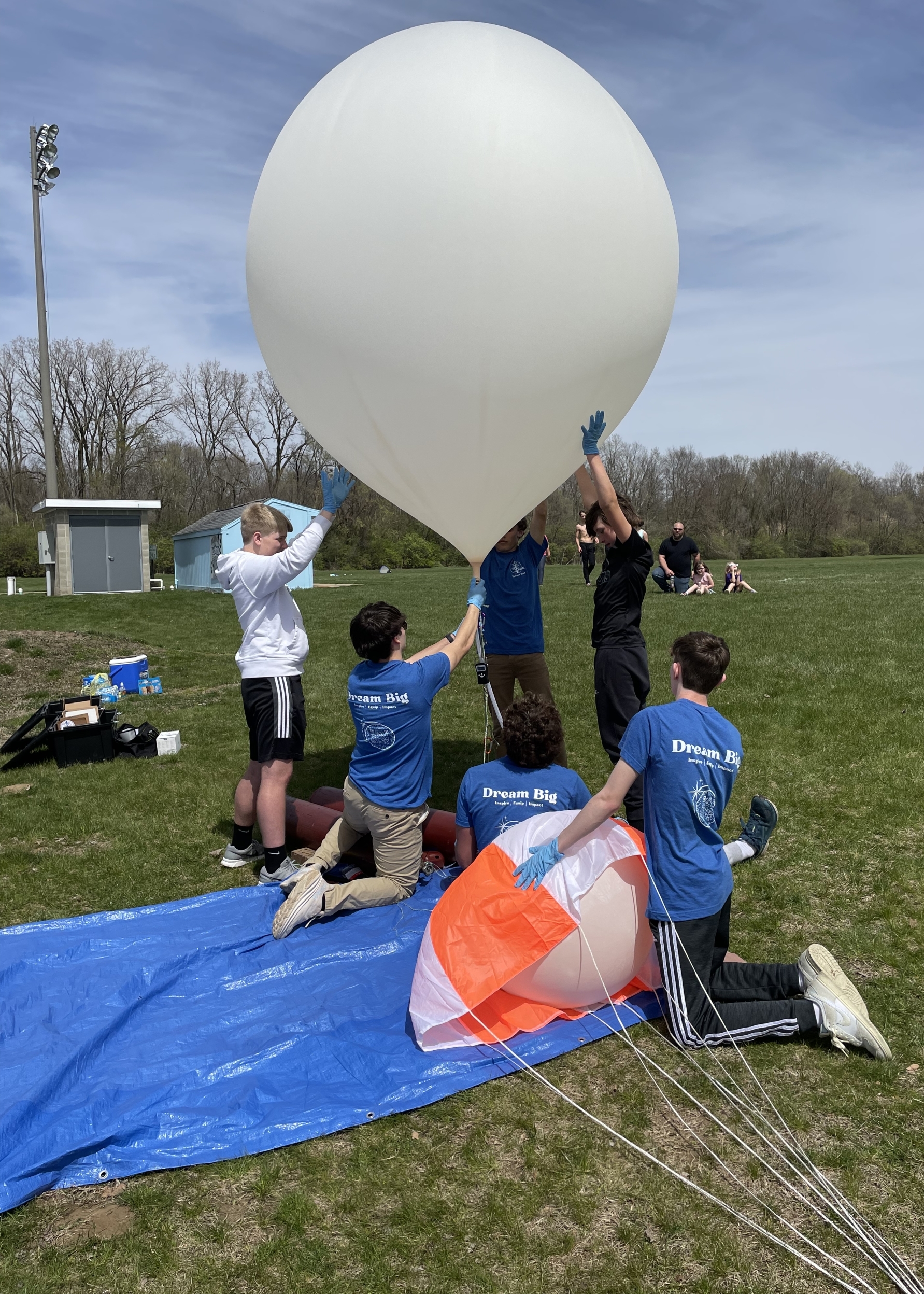 Stockbridge FFA members prepare for the launch by arranging payloads, filling the balloons and ensuring all parts are functional.