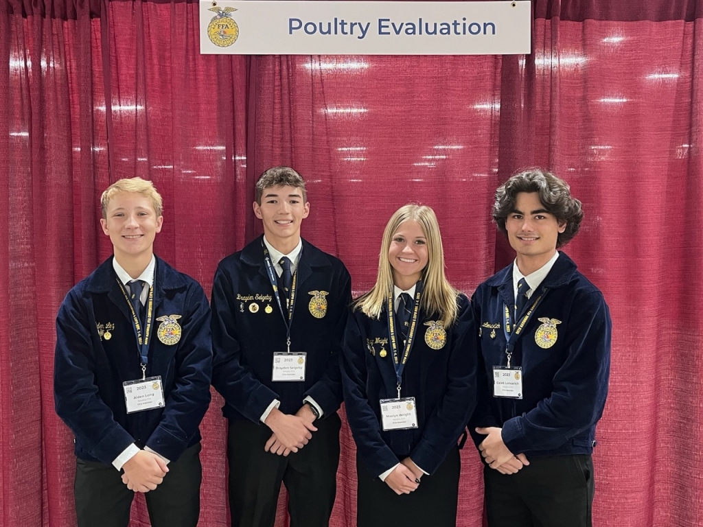 Brayden Selgeby (second from left) and his Neosho FFA teammates Aiden Long (left), Maelyn Wright (second from right) and Caleb Loncarich (right) compete in the National FFA poultry evaluation CDE competition.