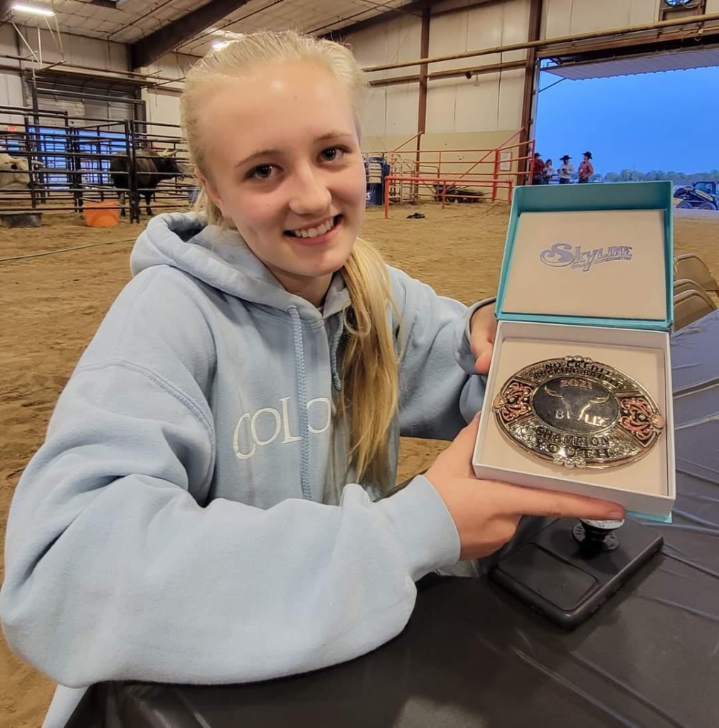 Taylor with the first competition buckle she won.