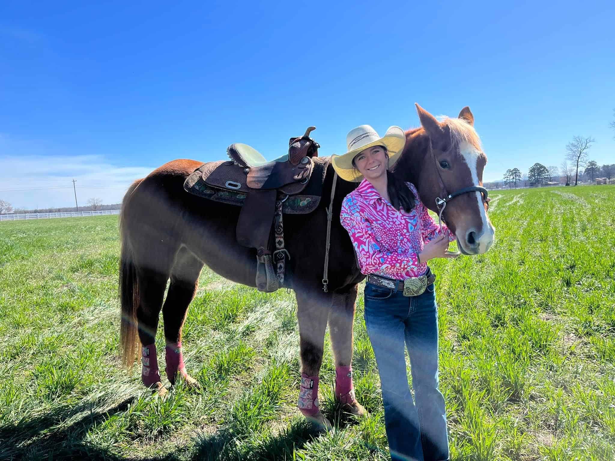 Lawson and her mare, Brownsugar, getting ready to compete in high school rodeo in March 2024.