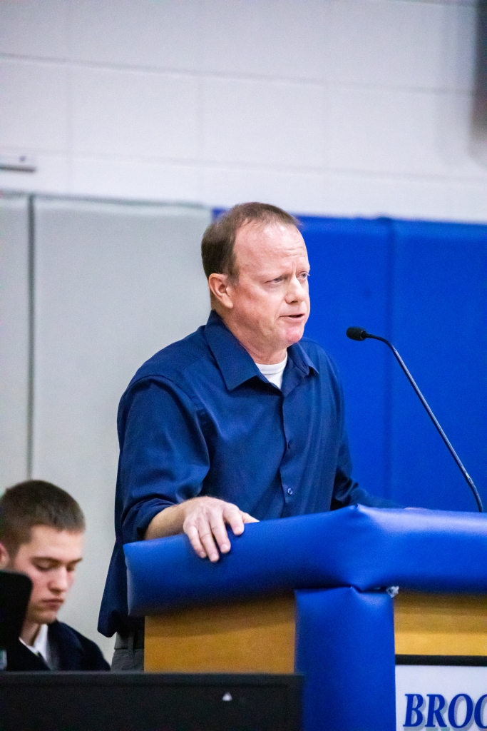 Brookfield High School teacher and veteran Joel Magnuson delivers his speech at the 2023 Veteran's Day assembly.