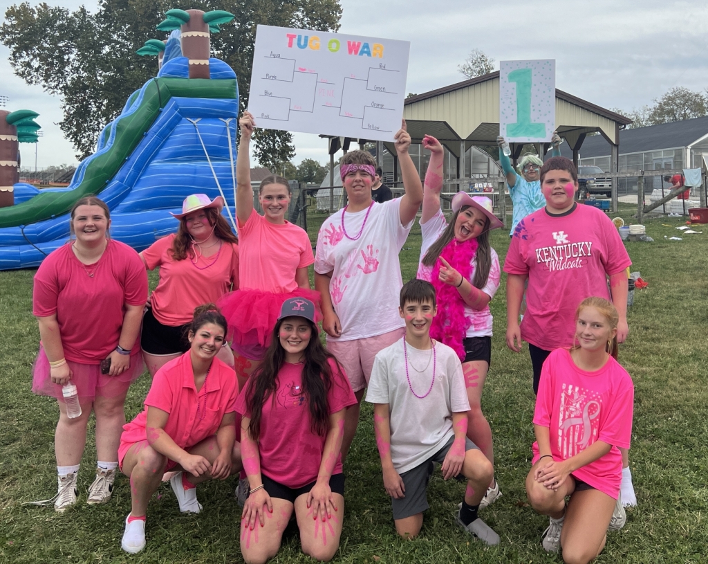 The Pink Team, which was led by chapter chaplain Ally Easley, celebrates their victory.