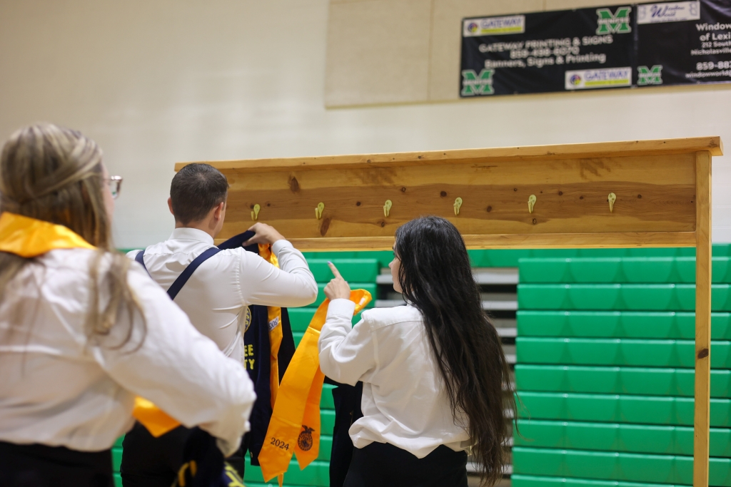 Senior FFA officers retire their jackets.