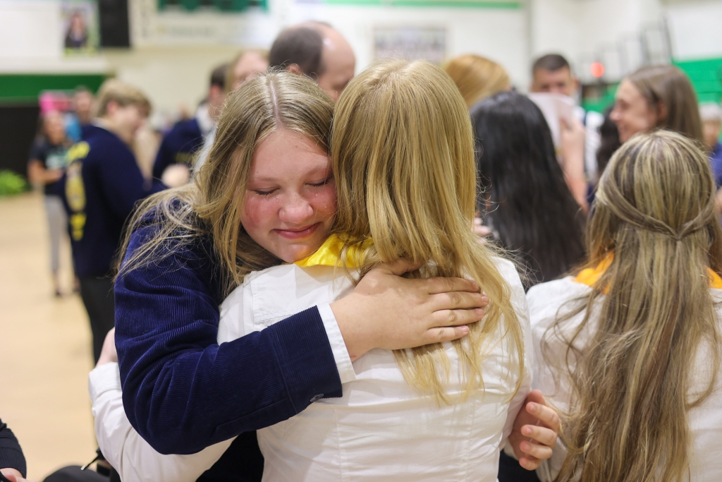 Menifee County FFA members share a heartfelt hug after their banquet.