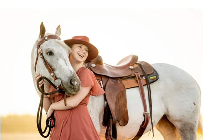 Lee and her horse, Pepper, an Appaloosa and Quarter Horse mix.