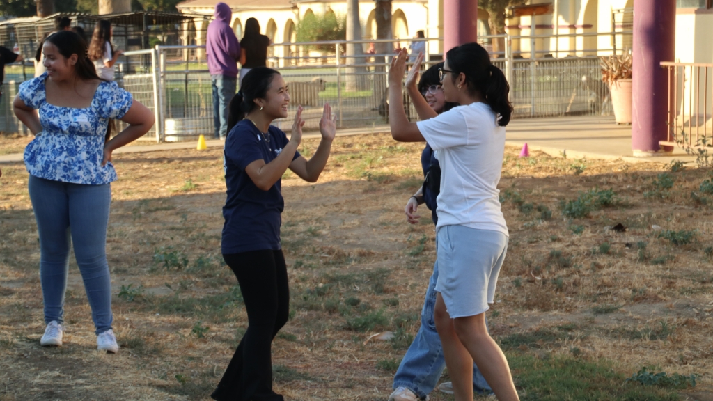 Temecula Saint Jeanne Catholic FFA students celebrating after a win in a game of “Shells.”