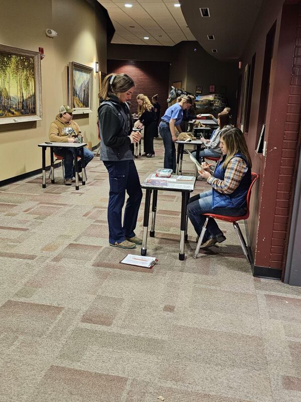 Conrad FFA member Alyson Leach completes a practicum in the veterinary science section of the seminar.