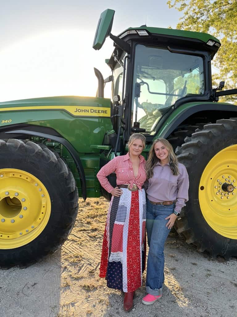 Yorkville Christian FFA President Grace Voitik (right) takes a break from organizing the Rock the Crop concert and Tire 101 educational session for a quick photo with Hailey Whitters (left). Photo courtesy of Firestone Ag.