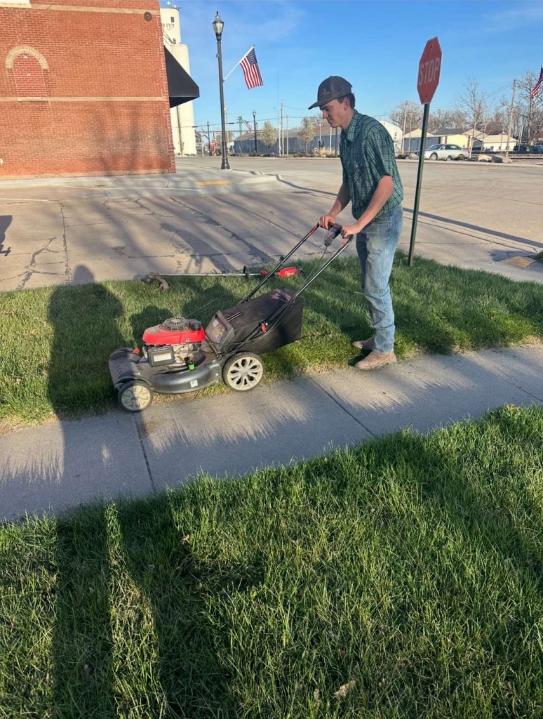 Boyer mowing for a local costumer.