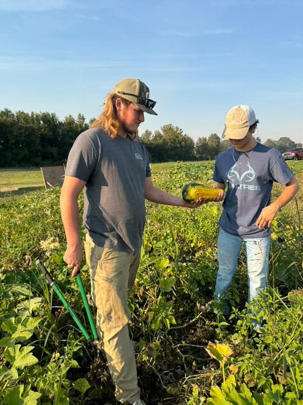 Brighton FFA chapter officers working in the Pumpkin Patch.