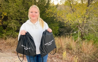 Kayla Leeper with her kindness bags.