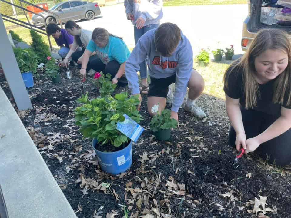 Dyer County FFA members work on horticulture projects in the community.