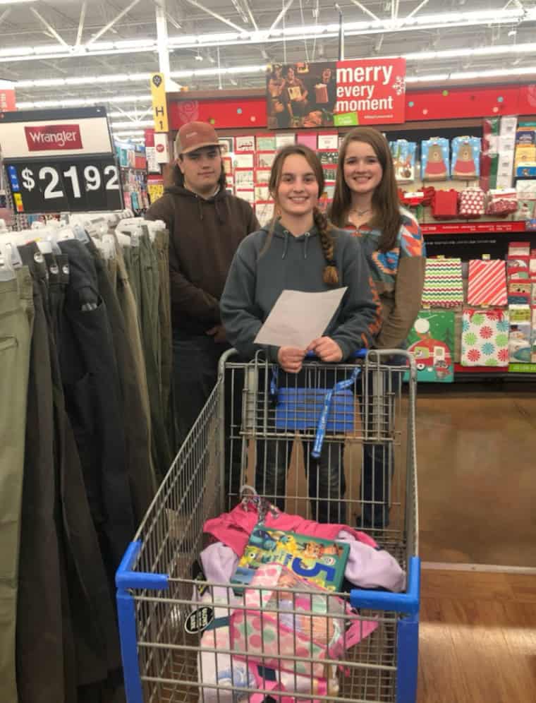 Bourbon County FFA members shop for their school district's Christmas Angels program.