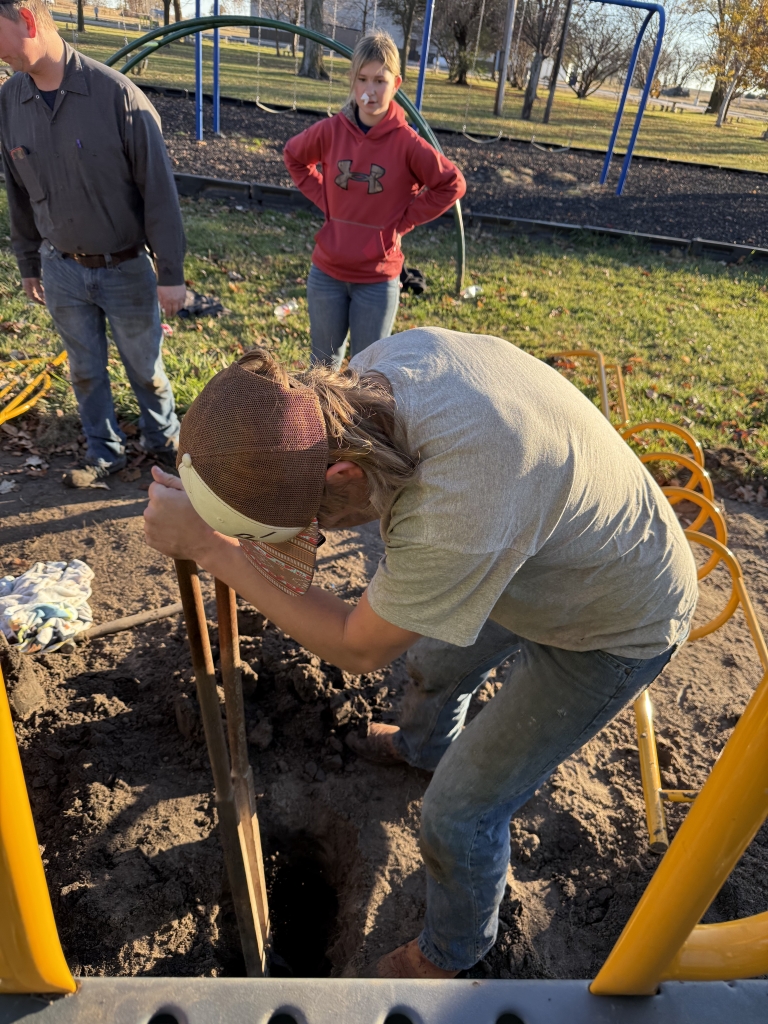 The Rock County FFA officers demonstrated service in this community improvement project. 