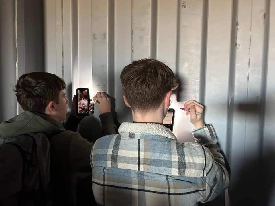 Madisonville Hopkins FFA members work on the container.