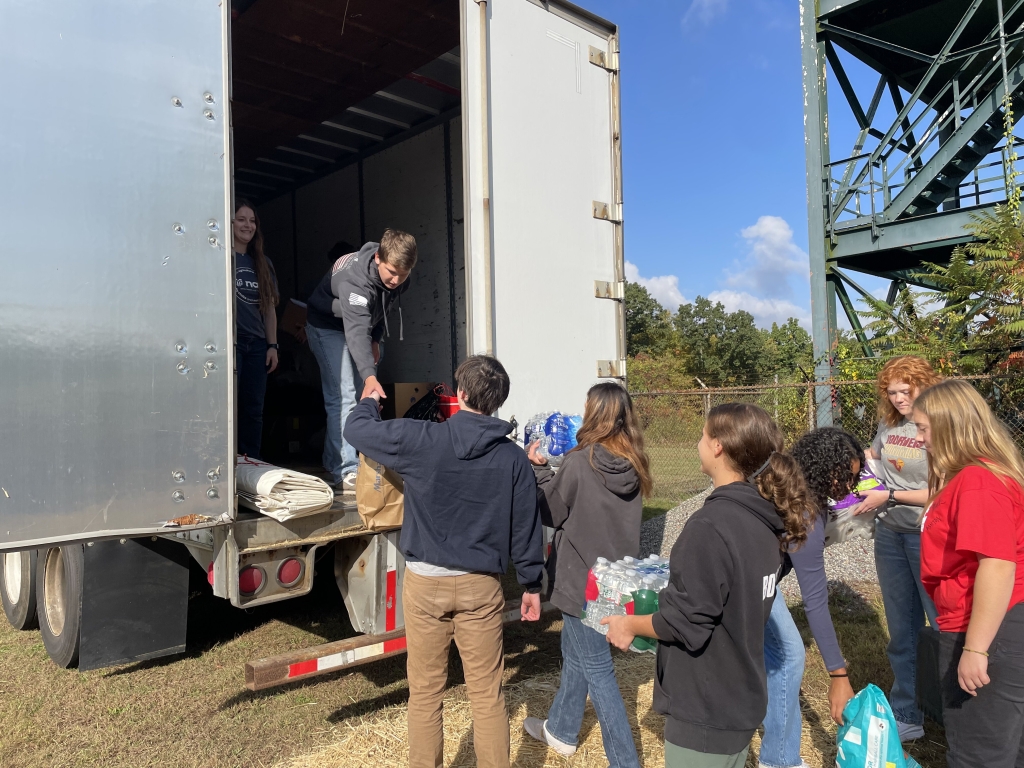 Hunterdon County FFA members work to fill a 53-foot trailer with hurricane relief donations.