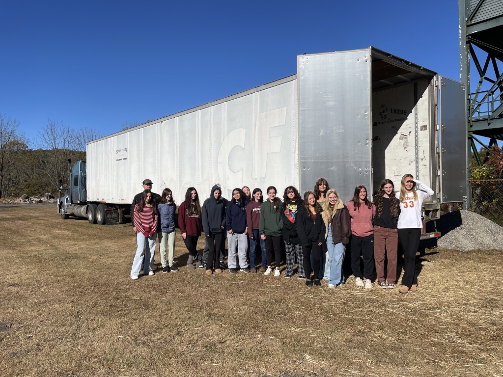 Hunterdon County Polytech FFA members stand in front of the 53-foot trailer used for donations.