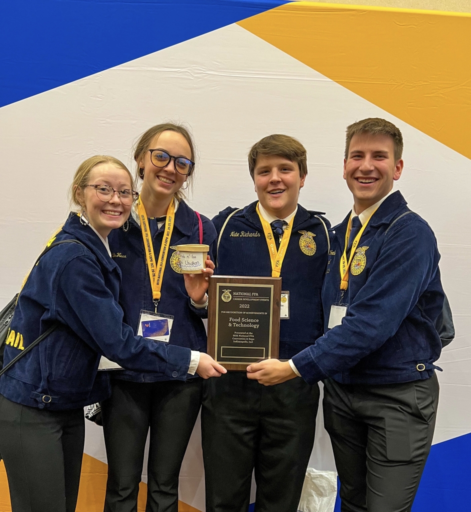 During his time as a Diamond Trail FFA member in Iowa, Voeller (far right) and his teammates competed in the National FFA Food Science and Technology Career Development Event. Photo courtesy of Trey Voller.