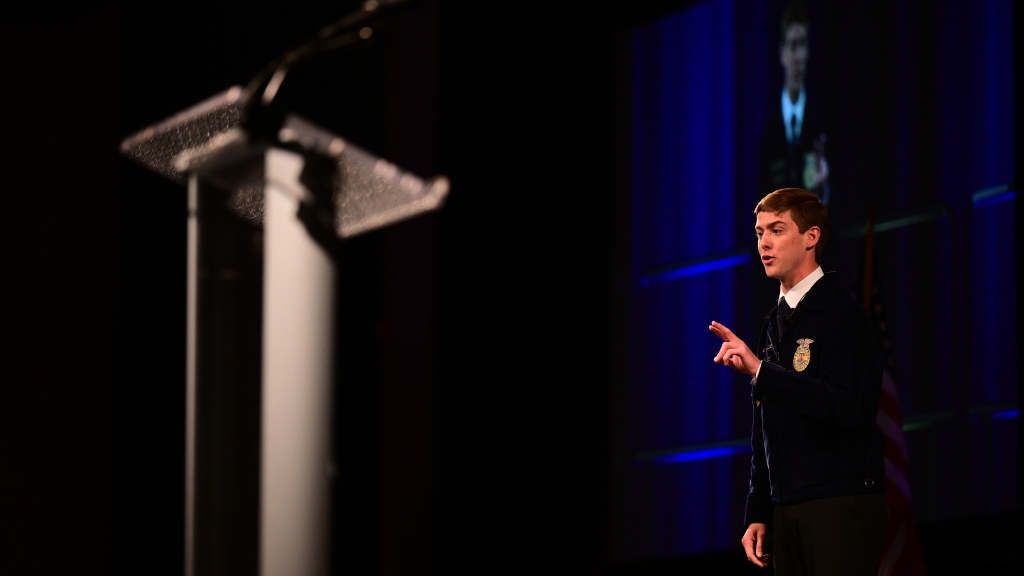 Coy Davidson, a member of the Elgin FFA Chapter in Oklahoma and the 2024 National FFA Prepared Public Speaking Leadership Development Event top participant winner, presents his speech during the 97th National FFA Convention & Expo.