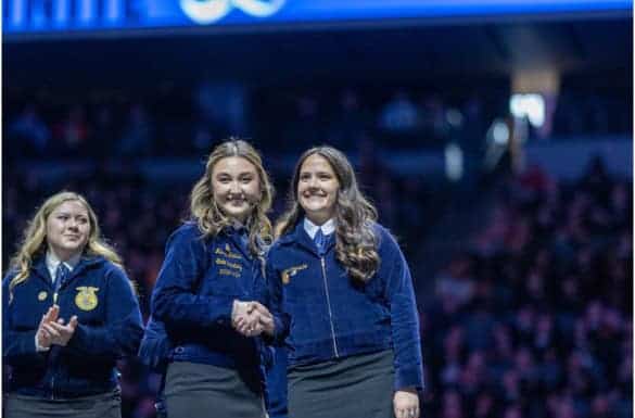 Tessa Camacho (right) accepts her agriscience research award during the 2024 California State FFA Leadership Conference. Photo courtesy of Tessa Camacho.