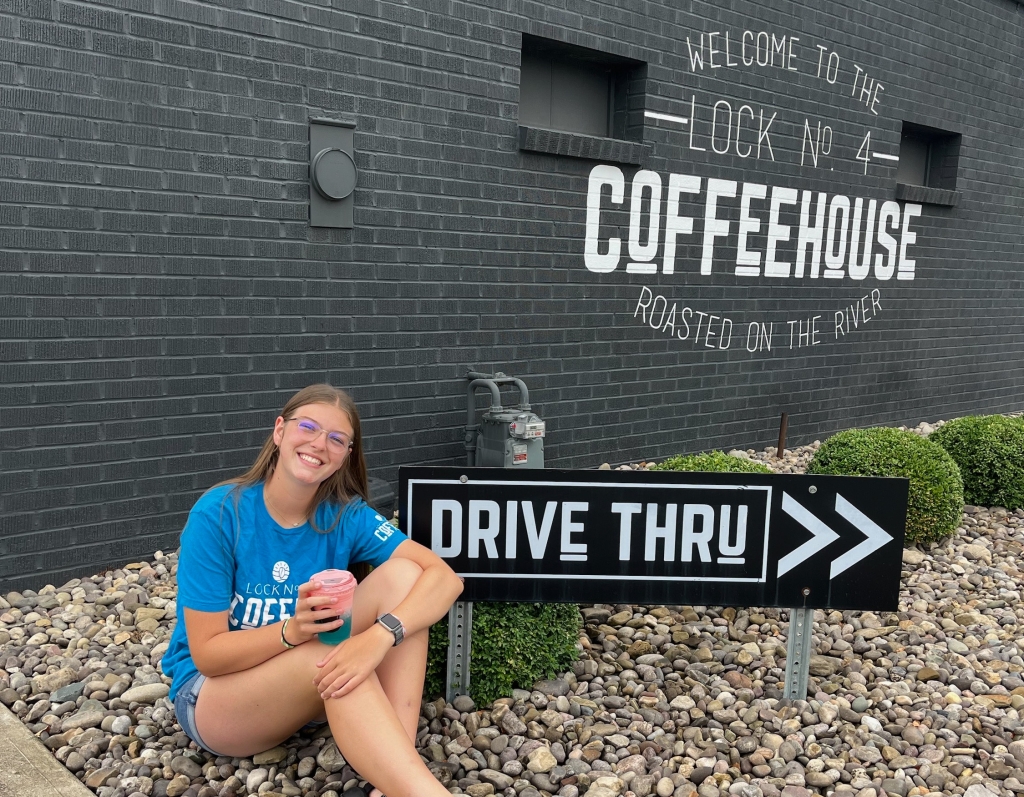 Julia Silvus poses in front of Lock 4 Coffee House in Beverly, Ohio.