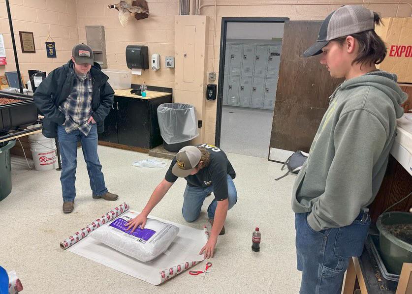 Montevideo FFA members gathered to wrap gifts to donate to a family in need.