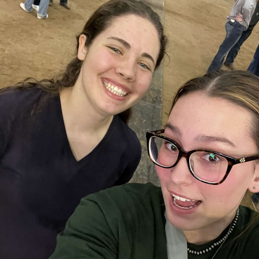 Rapid City Stevens FFA members Kaiva Coleman and Daphne White take a break from cleaning up.