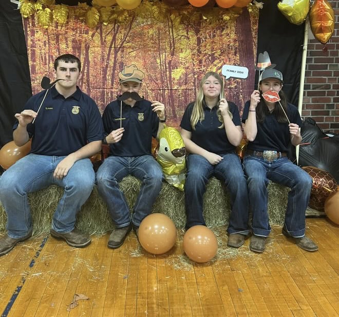 South Kitsap FFA members have fun at the photo booth.