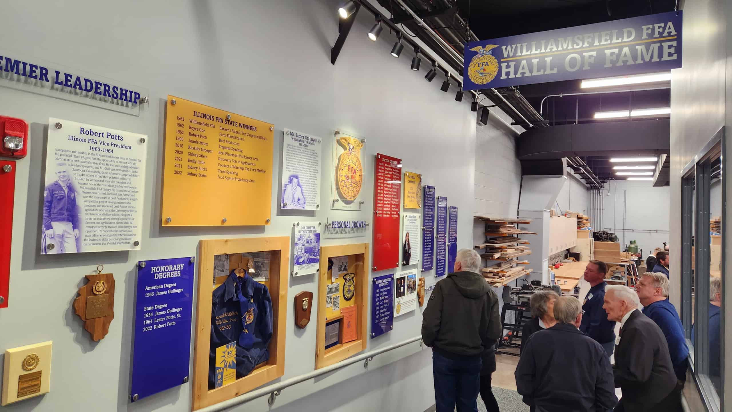 Community members visit the Williamsfield FFA Hall of Fame during the first open house of the new classroom.