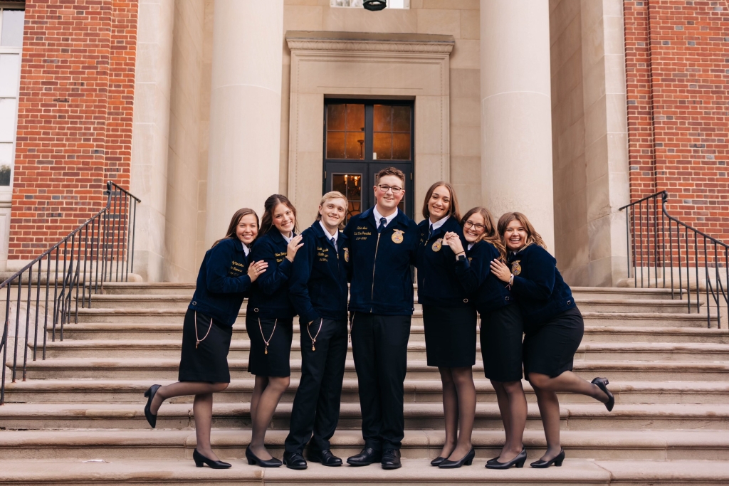 Pennsylvania FFA state officers Emily Kerstetter (far left), Chloe Bomgardner (second from left), Evan Espenshade (third from left), Nathan Lesh (center), Sydney Albright (third from right), Jaclyn Martin (second from right) and Kennady Laird (far right).