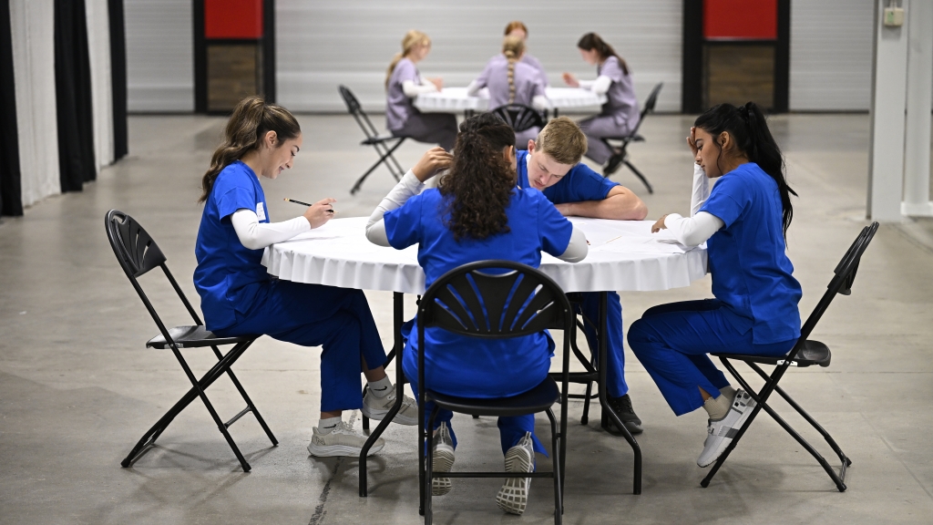 Team members compete in the National FFA Veterinary Science CDE during the 97th National FFA Convention & Expo in Indianapolis.