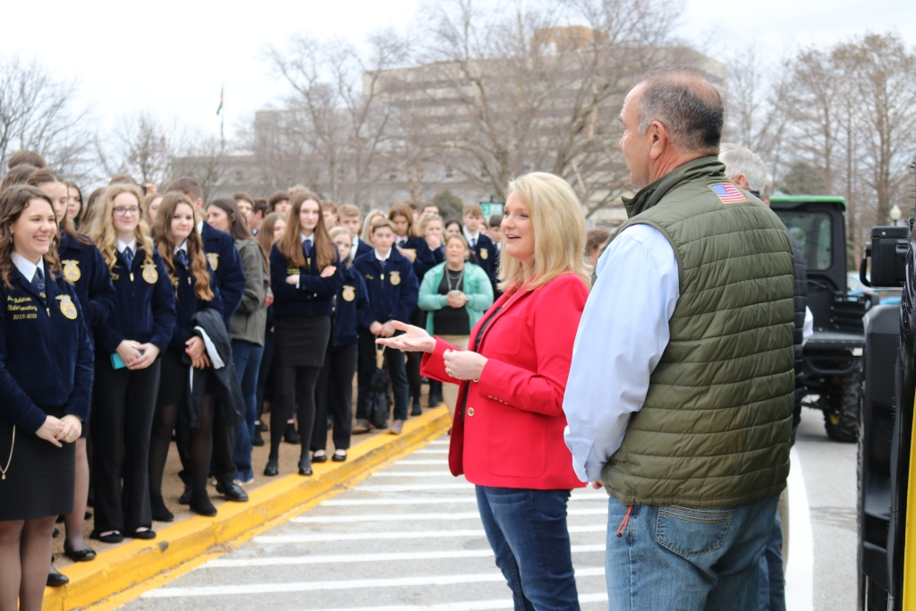 Director Chris Chinn and Governor Mike Kehoe speak at the “Drive Your Tractor to Work Day.”