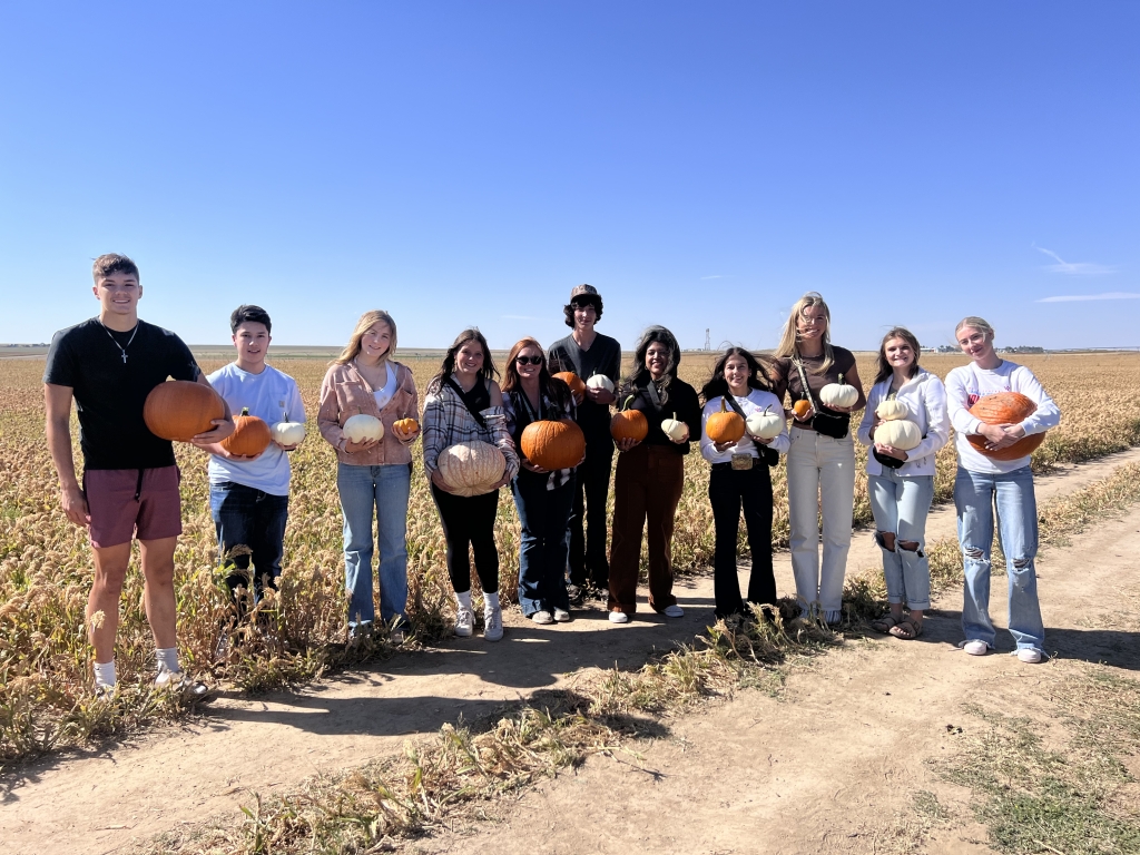 Madsen and her agricultural business class visit her family farm.