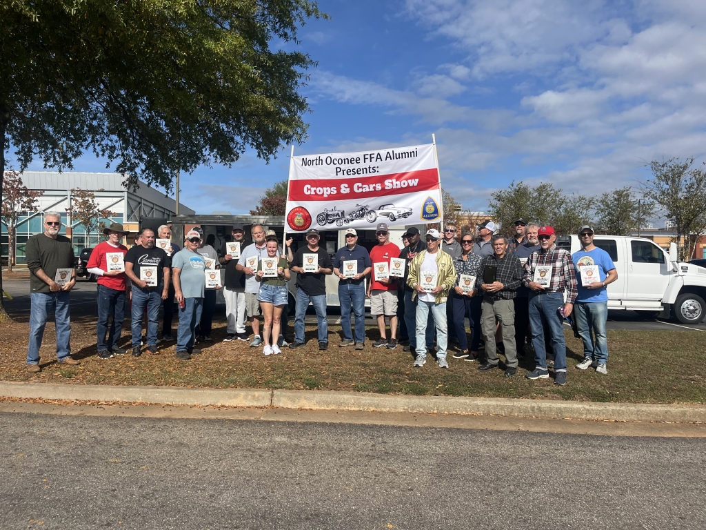 The Top 25 car owners receive plaques in recognition of their achievements in the car show.