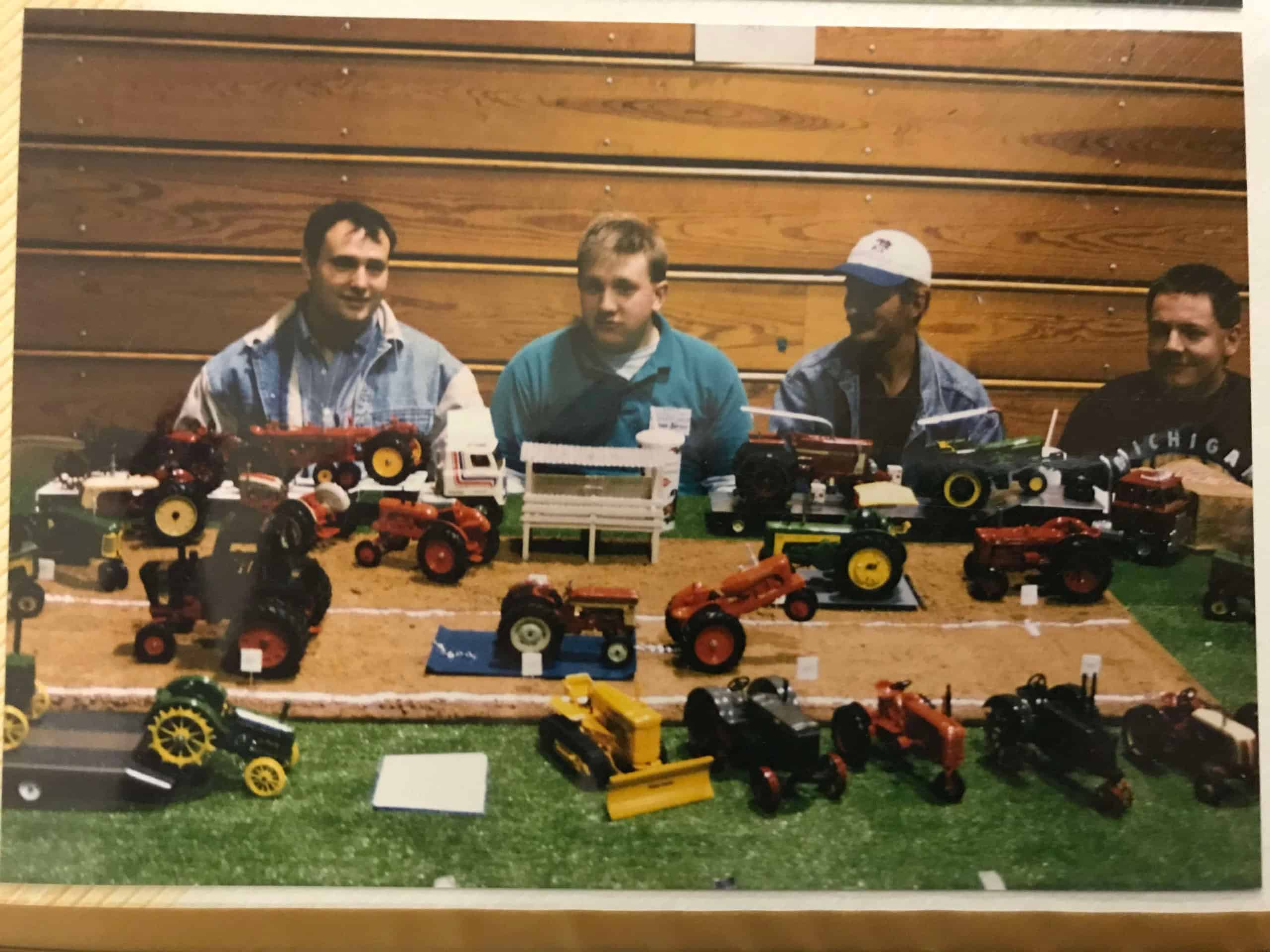 FFA member Jason Kerrer poses behind one of his farmscapes.