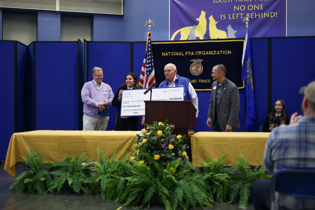 Nick Carter, chairman of the Kentucky FFA Foundation, announces the launch of an endowment made in Groth’s honor to support the FFA chapters in Fayette County.