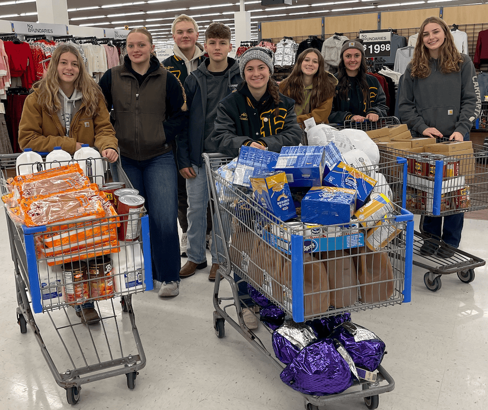 The Evergreen FFA officer team went to Walmart to purchase additional food for the families’ meals.