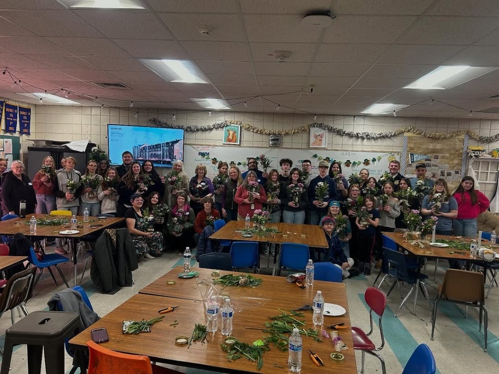 Goldendale FFA members pose with newly created flower arrangements that are ready to be delivered to community members and supporters.