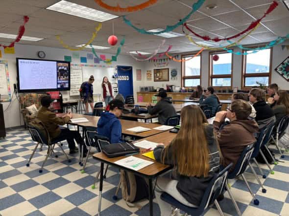 Corvallis FFA members teach middle school students about FFA.