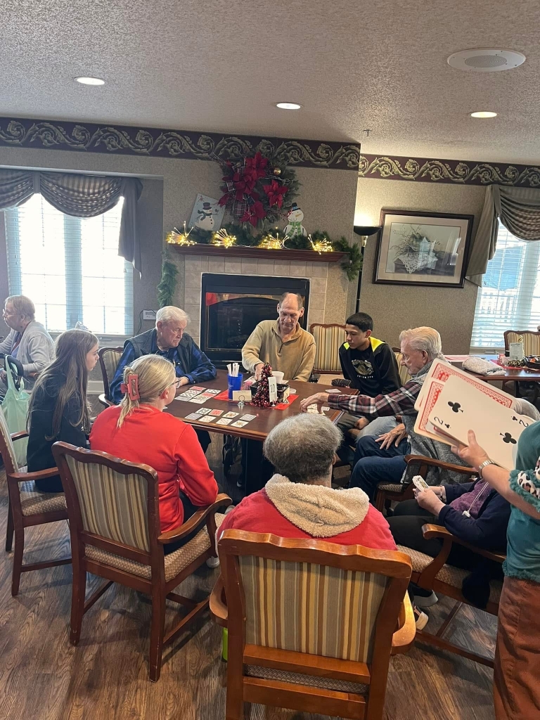 FFA member Jovani talks to and plays games with the residents.