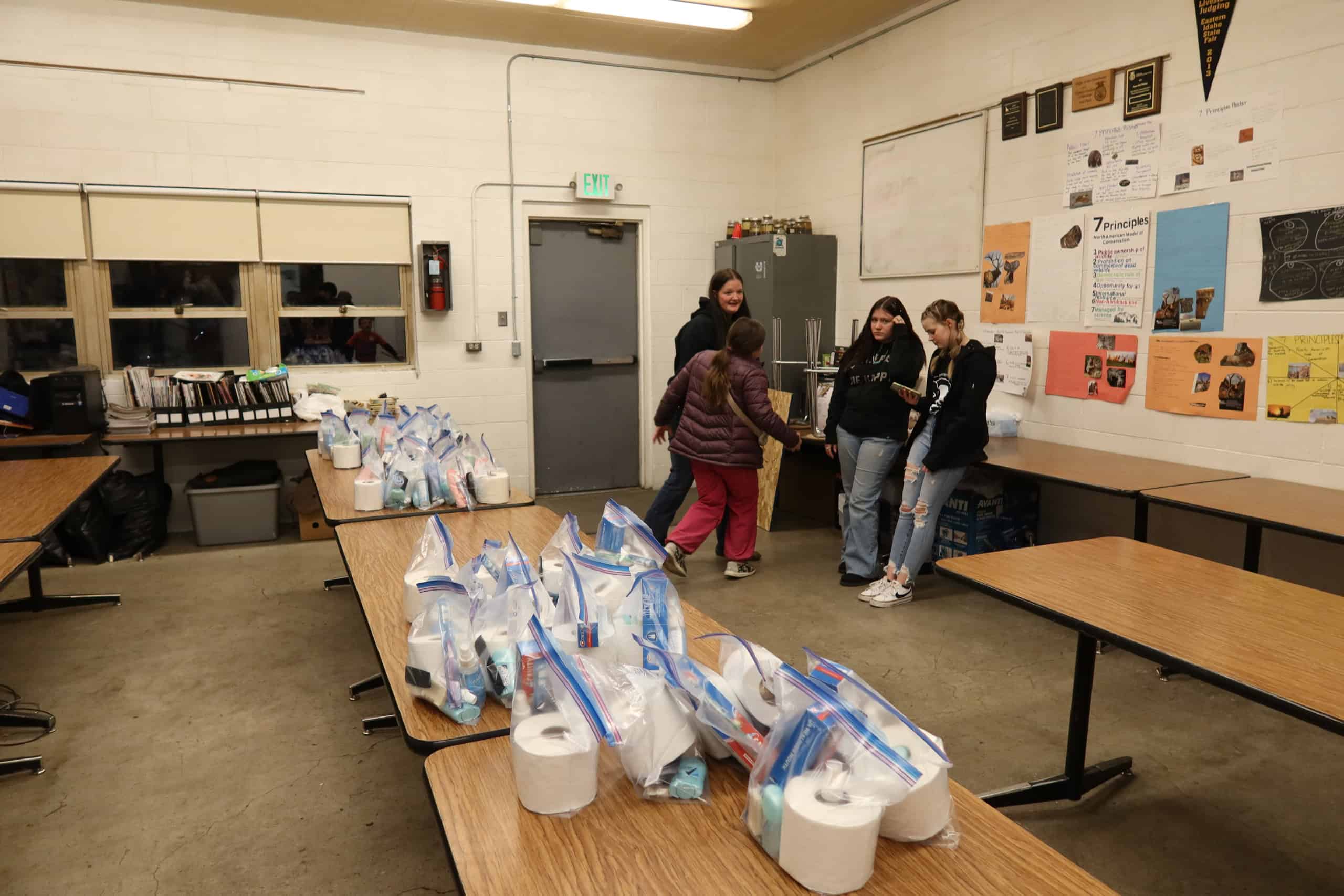 Some members from the Sugar-Salem FFA Chapter making Hygiene kits.