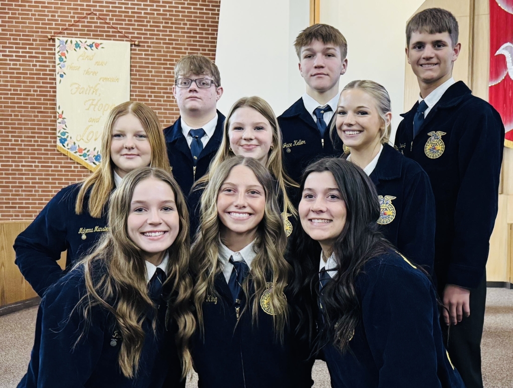 Members of the Brookfield FFA Chapter and Brookfield High School Wrestling Team gather for a photo after worshiping on FFA Sunday.