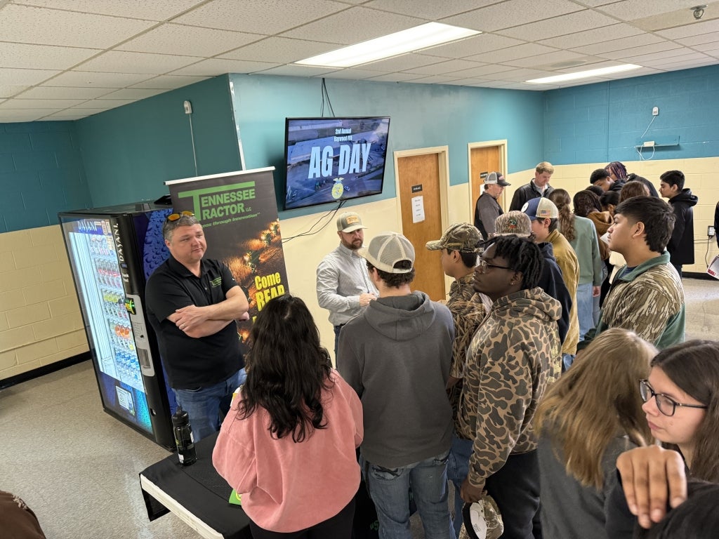 A Tennessee Tractor representative speaks with students at the Haywood FFA Ag Career Day.