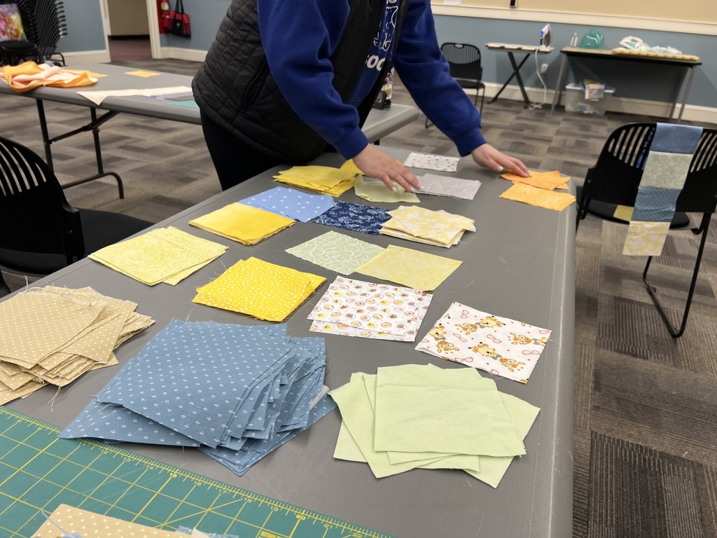 All materials for the quilts were donated by members of the community.