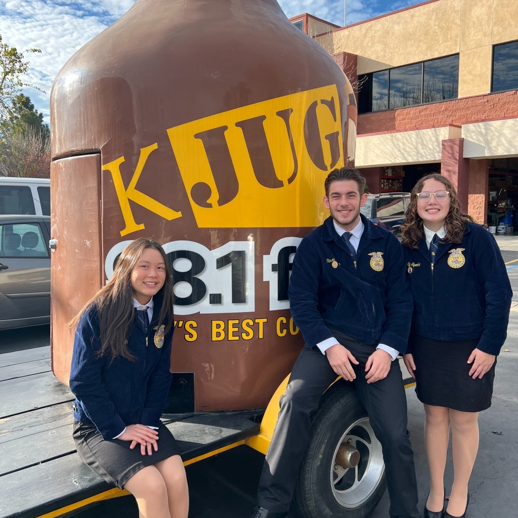 San Luis Obispo FFA Chapter Treasurer Mila Shih (left), Vice President Stevie Bates (middle) and Reporter Holly Speake (right) in front of their local radio station.