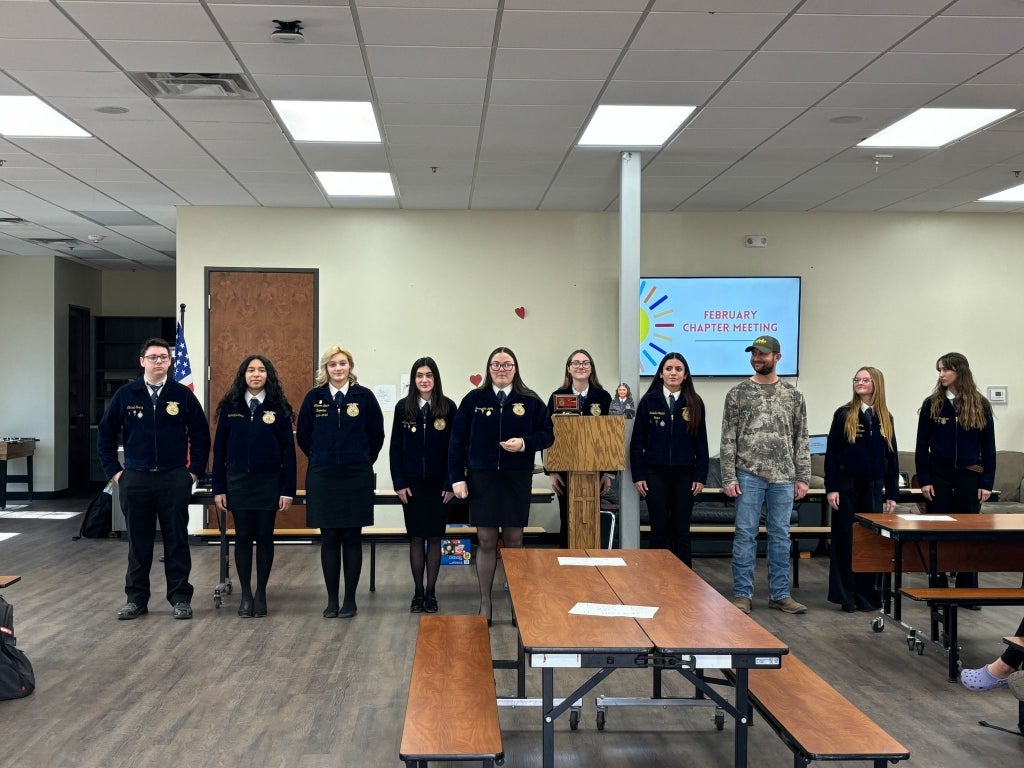 AAEC-EM FFA officers perform opening ceremonies during their February chapter meeting. 